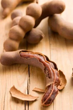 Tamarinds on kitchen table Stock Photos