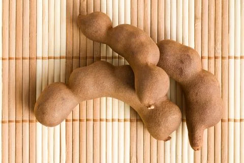 Tamarinds on kitchen table Stock Photos