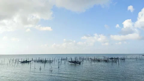 Tame lapse fish trap placed in the sea with cloud timelapse nature background. Stock Footage 271138600