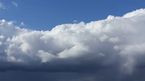 Tame lapse. White fluffy clouds transforming to heavy storm Stock-Footage 140105985