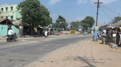 Tamil Nadu various vehicles on bumpy road 4 Stock Footage 24027096