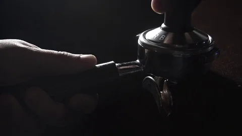 Tamping of coffee in slow motion Video stock 82732004