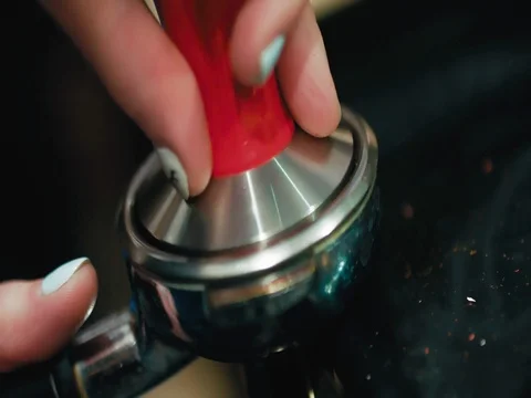 Tamping Fresh Ground Coffee Video stock 77054577