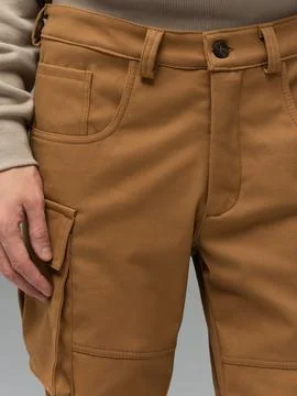 Tan cargo pants front pocket detail Stock Photos