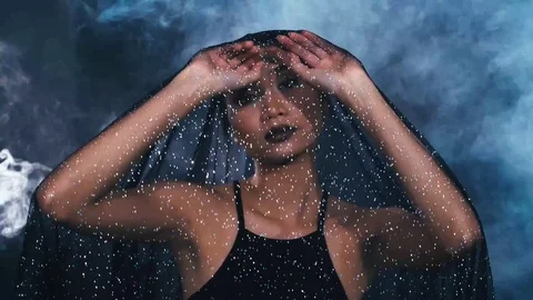 Tan Skin Asian Woman black hair dark lip with Dense White Smoke Stock Footage