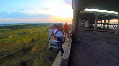 Tandem jump at sunset Stock Footage 43807276