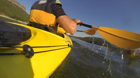 Tandem kayaking in a dam Stock Footage 102435924