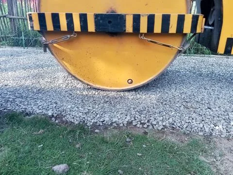 Tandem roller leveling the Pathway, heavy equipment. Фото