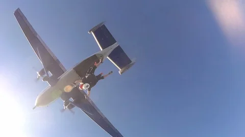 Tandem skydiving. Jumping out. Stock Footage 94040870