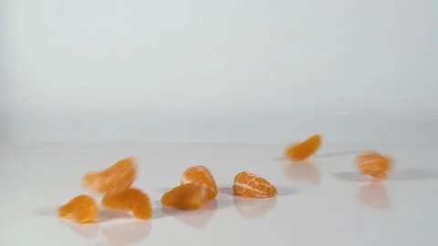 Tangerine falls apart Stock Footage 145990792