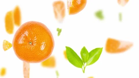 Tangerine fruit Slice and Leaf Stream Stock Footage 182824140