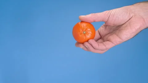 Tangerine-Hand 스톡 동영상 217516430