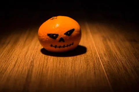 Tangerine jack o'lantern Stock Photos