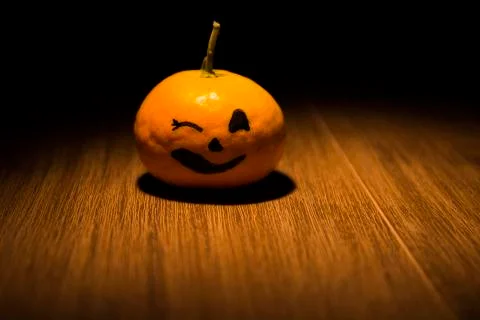 Tangerine jack o'lantern Stock Photos