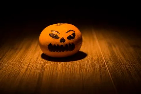Tangerine jack o'lantern Stock Photos