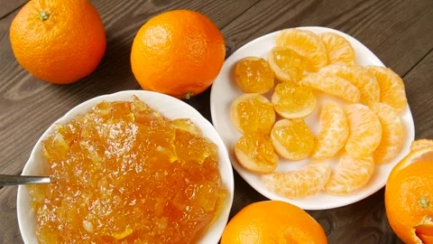 Tangerine jam on the plate. Stock Footage 301860887