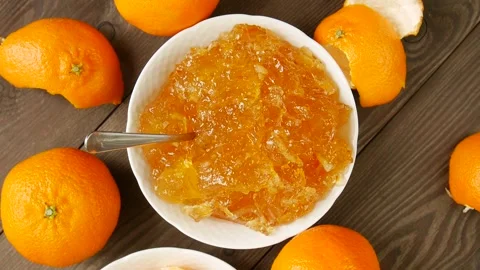 Tangerine jam on the plate. Stock Footage 302052980