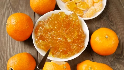 Tangerine jam on the plate. Stock Footage 302053163