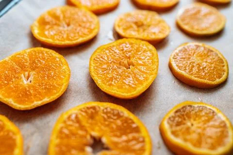 Tangerine orange slice on baking sheet Stock Photos