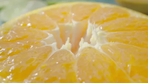 Tangerine on rotating background Stock Footage 290429305
