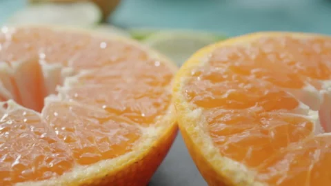 Tangerine on rotating background Stock Footage 292499141