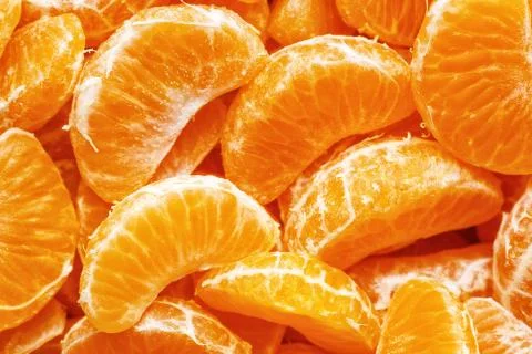 Tangerine segments, orange background texture,Flat lay, top view.healthy citr Stock Photos