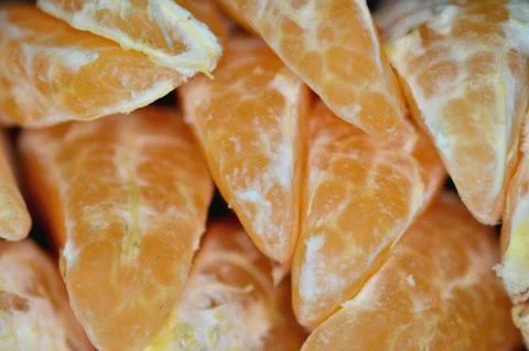 Tangerine segments Stock Photos
