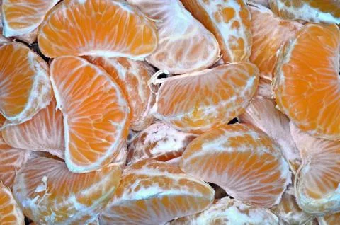 Tangerine segments Stock Photos