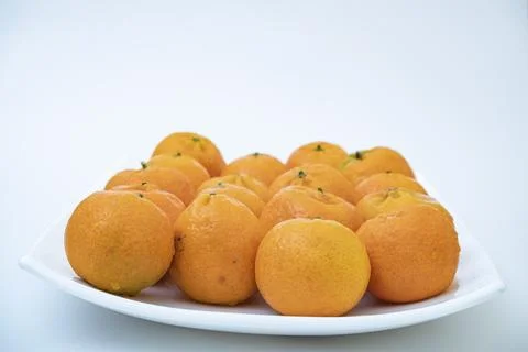 Tangerine on a white background Stock Photos
