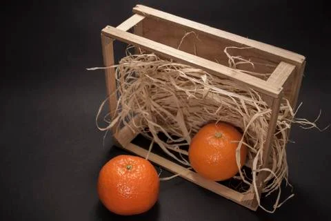 Tangerines on a black background Stock Photos