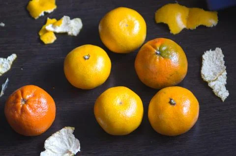 Tangerines on a black table Stock Photos