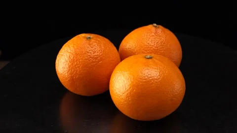 Tangerines close up on black background Stock Footage 140414957