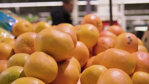 Tangerines on counter in a supermarket. Stock Footage 125521189