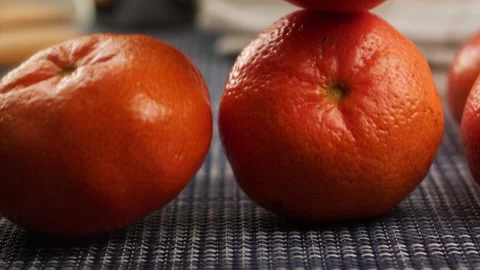 Tangerines fall on the kitchen in slow motion Stock Footage 156872273