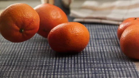Tangerines fall on the kitchen in slow motion Stock Footage 158307631