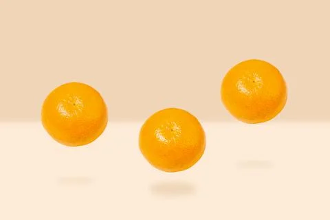 Tangerines hovering in the air 写真素材