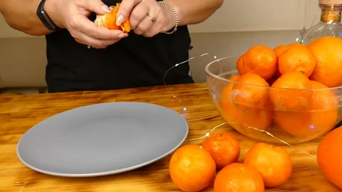 Tangerines on the table Stock Footage 231159373