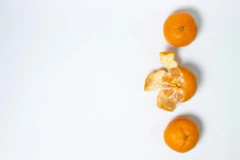 Tangerines on a white background. Citrus fruit.  Stock Photos
