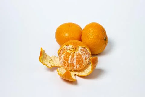 Tangerines on a white background. Citrus fruit.  Stock Photos