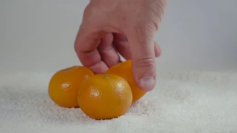 Tangerines is on the white background Stock Footage 127857678
