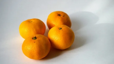 Tangerines on white background. I put tangerine. 1 Stock-Footage 97707497