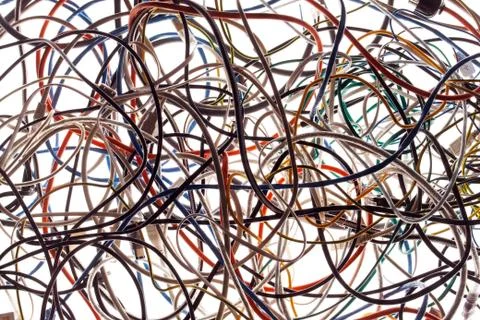 A tangle of colored wires on the ground Stock Photos
