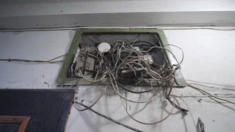 Tangled And Knotted Electrical Cables In Electric Service Panel Stock Footage 271628563