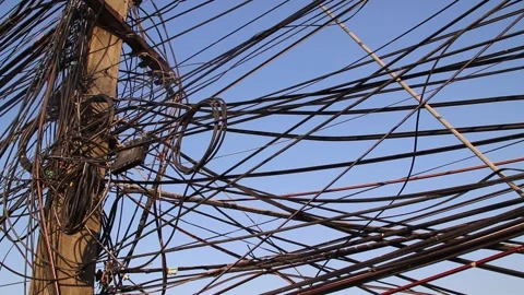 Tangled electric wire cables on a pole Stock Footage 306398619
