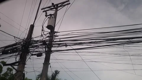 Tangled electrical wire suspended on streets of Cebu Stock Footage 245589305