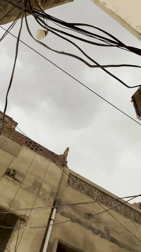 Tangled Electrical Wires and Cables Against Overcast Sky Stock Footage 332083670