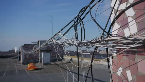 Tangled Internet Data Cables Extending Across Urban Rooftop Exterior Stock Footage 347537634