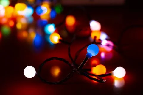 Tangled multi colour Christmas tree lights Foto stock
