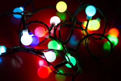 Tangled multi colour Christmas tree lights Stock Photos