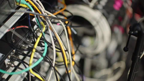 Tangled Network and Audio Cables on Equipment Rack, Close-Up Stock Footage 339382647